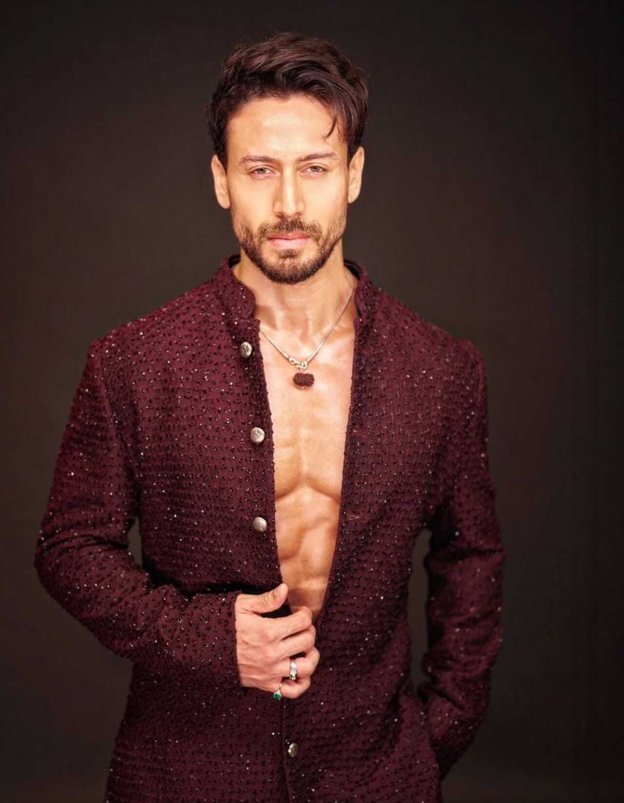 The deep maroon/burgundy shade kurta instantly lends a royal, evening-occasion energy. Tiger pairs it with dark jewel tones that elevate festive menswear.